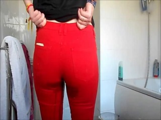 she wets her red jeans